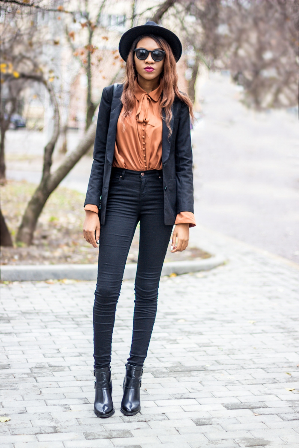 Simple Trendy Outfit With A Hat In Hand